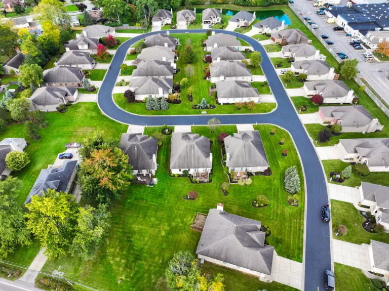 Aerial view Amherst Forest Creek Estates housing development showing loop in road