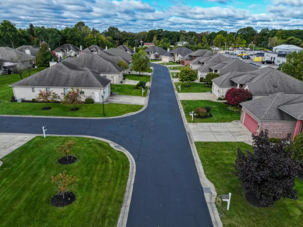 Aerial view of Road at Amherst Forest Creek Estates housing development