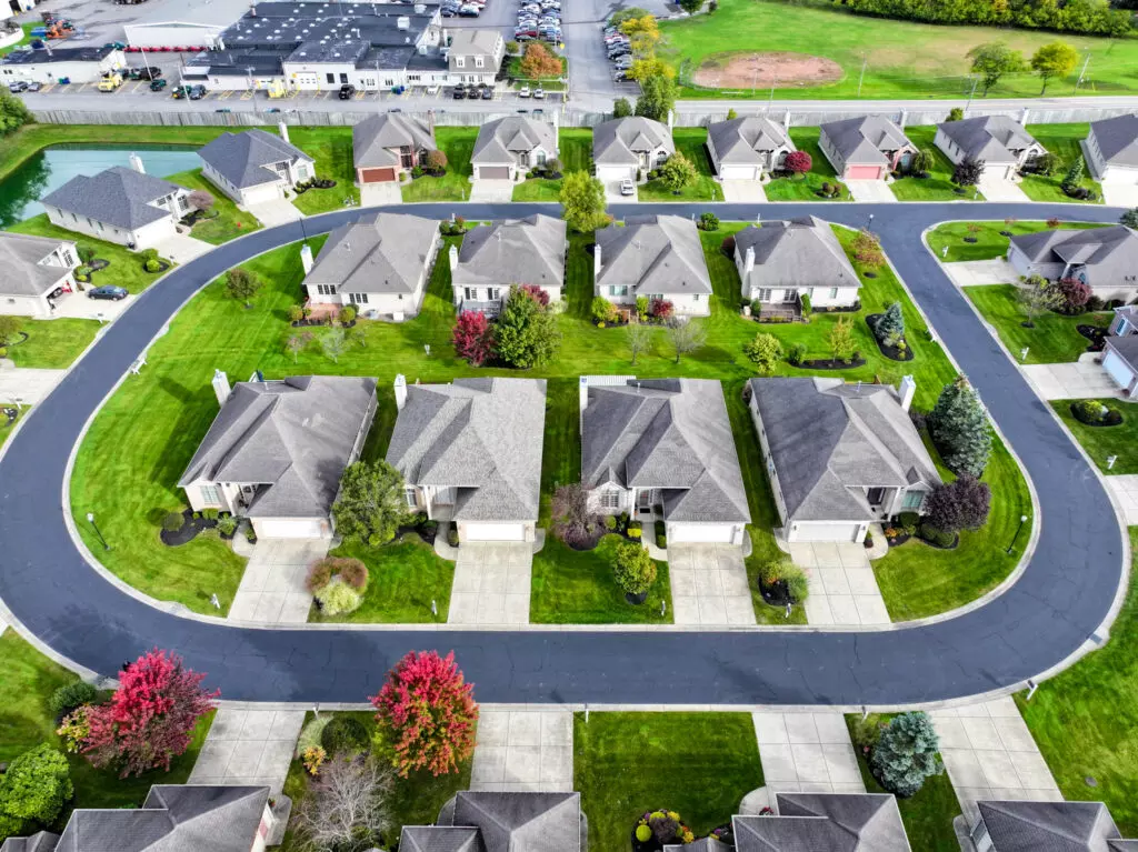 Aerial view Amherst Forest Creek Estates housing development houses in a row