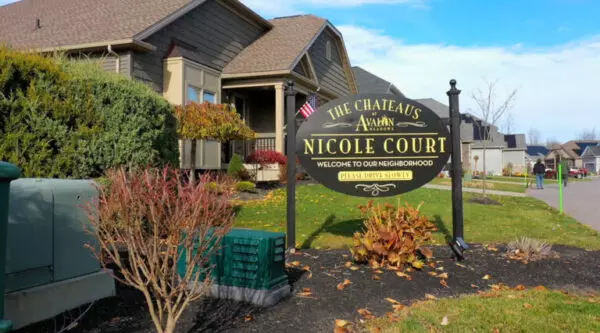 Sign in front of Chateaus at Avalon housing complex